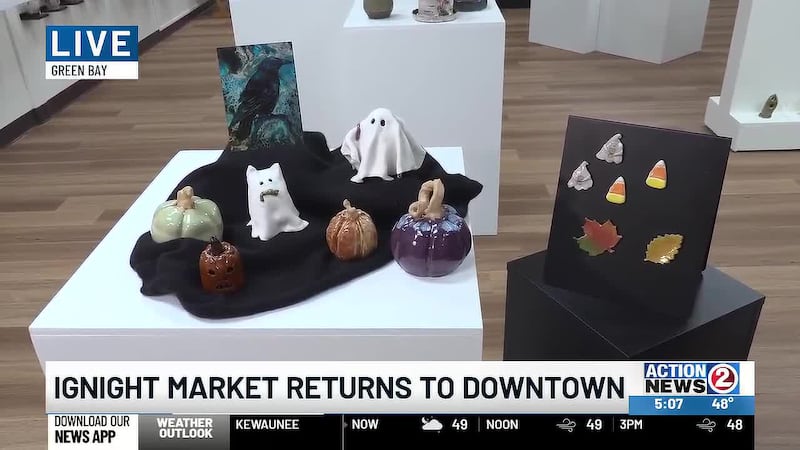 Halloween art displayed for igNight Market in downtown Green Bay