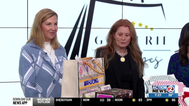 Diane Philbin and Toni McBride show off products that will be available at the Gallerie of...