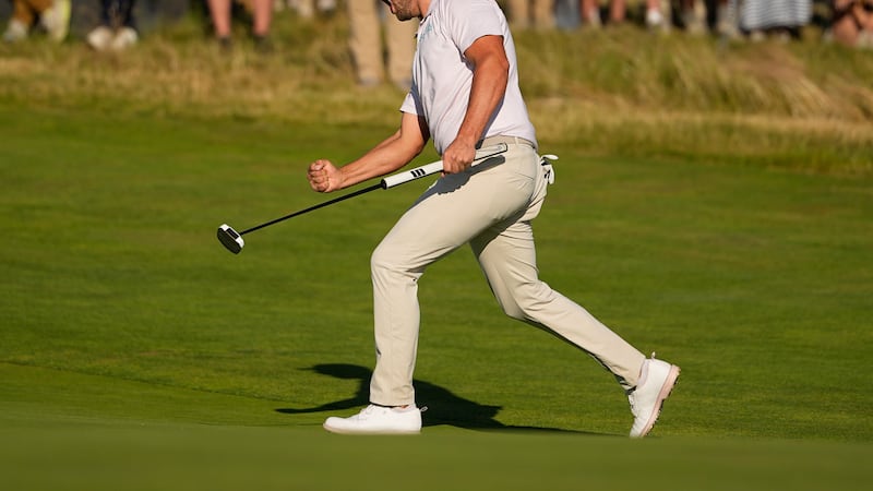 Wyndham Clark celebrates after a birdie on the 16th hole during the final round of the U.S....