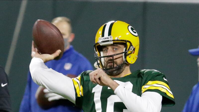Green Bay Packers quarterback Aaron Rodgers (12) throws before an NFL football game against...