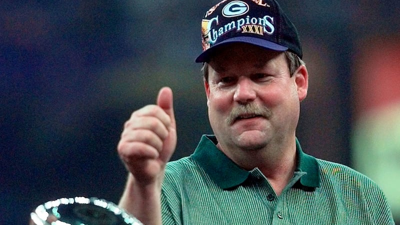 FILE - In this Jan. 26, 1997, file photo, Green Bay Packers coach Mike Holmgren gives a thumbs...