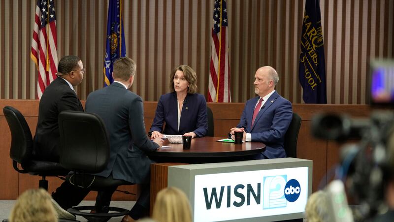 Wisconsin Supreme Court candidates Brad Schimel and Susan Crawford participate in a debate...