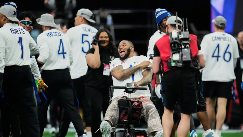 NFC defensive end Micah Parsons (1) of the Green Bay Packers, celebrates after a touchdown...