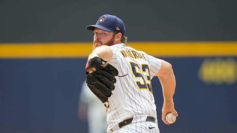 Milwaukee Brewers pitcher Brandon Woodruff throws during the second inning of a baseball game...