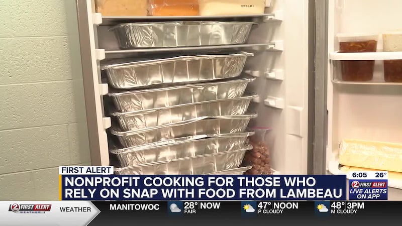 Unused Lambeau Field game day food is refrigerated until it's prepared for area food pantry...
