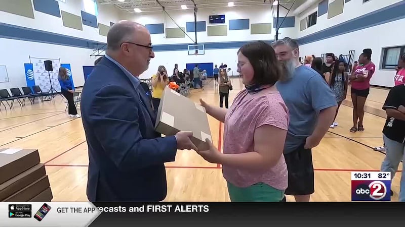AT&T, Comp-U-Dopt team up to get laptops, backpacks to Fox Valley students